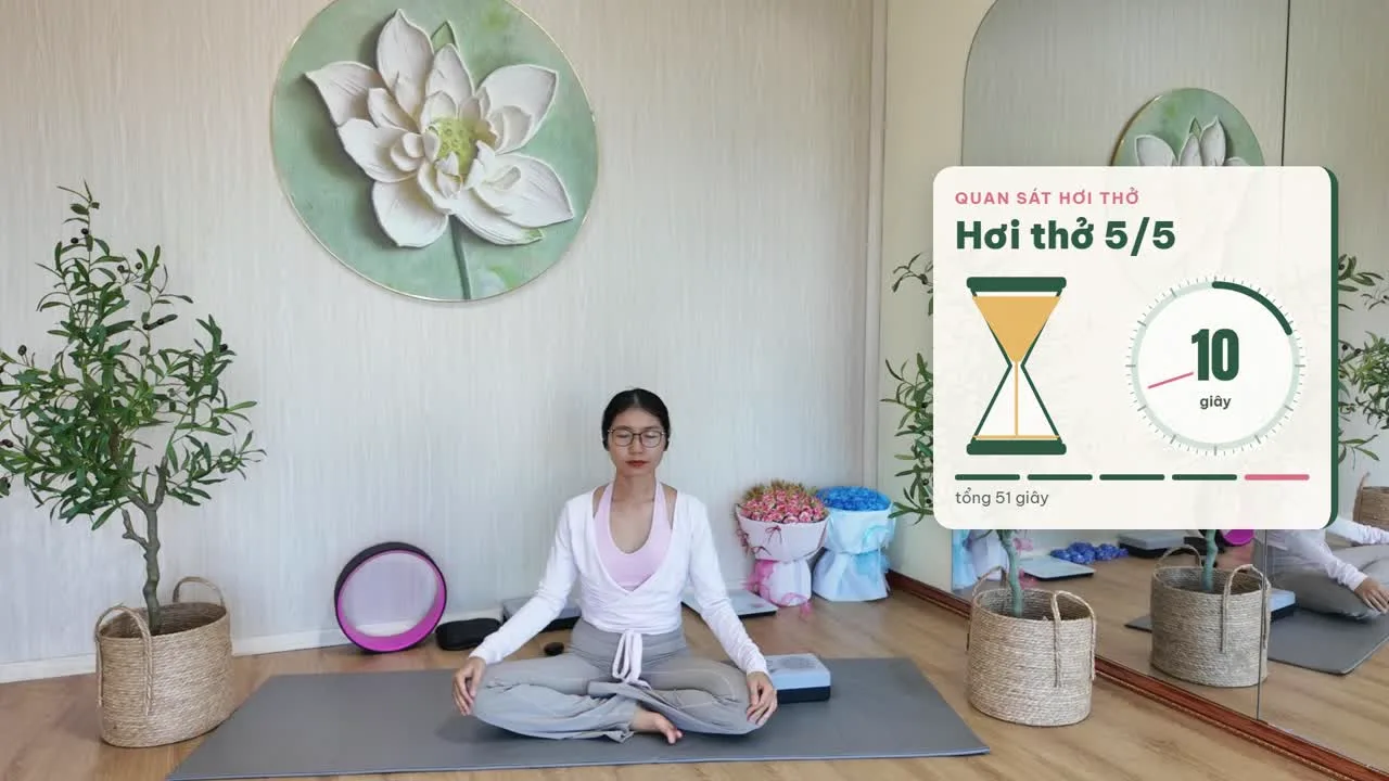 Đồng hồ cát và đồng hồ đếm giây hiện trên video khi tập thở